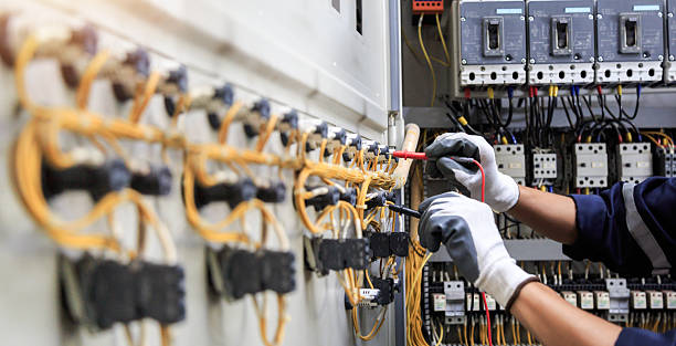 Professional Electrician technician working in Amityville, NY